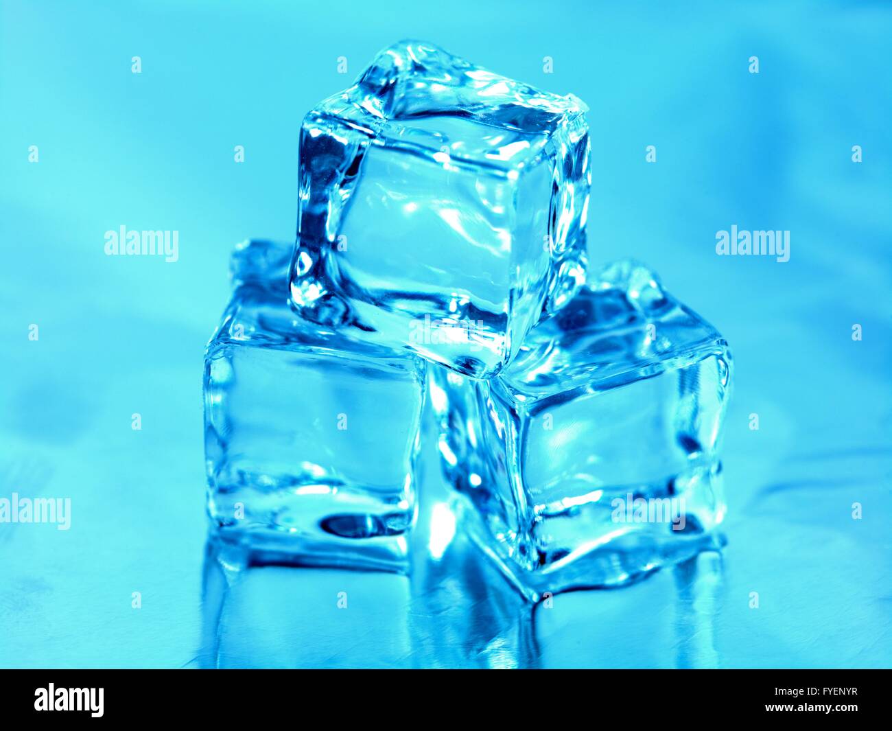Ice cubes isolated against a white background Stock Photo - Alamy
