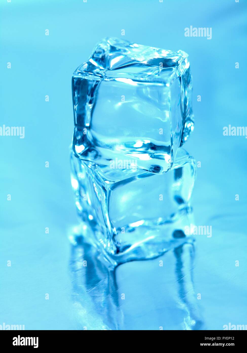 Ice cubes isolated against a white background Stock Photo - Alamy