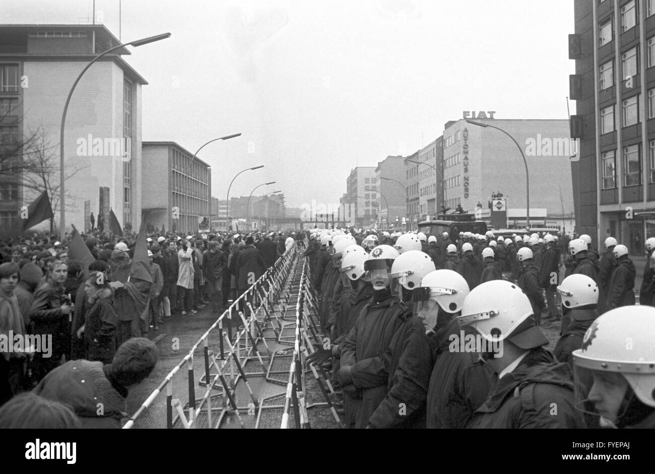 About 1,000 members, primarily students, of the APO (extra-parliamentary opposition) demonstrate against the SPD on the occassion of the 50th anniversary of Rosa Luxemburg's and Karl Liebknecht's assassination on 18 January 1969. Stock Photo