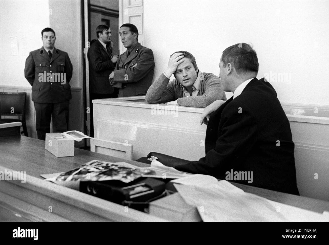 Student leader Daniel Cohn-Bendit (centre) talks to his lawyer Heinrich Hannover. He had to face the charge of civil disorder on 27 September 1968 in Frankfurt. Stock Photo