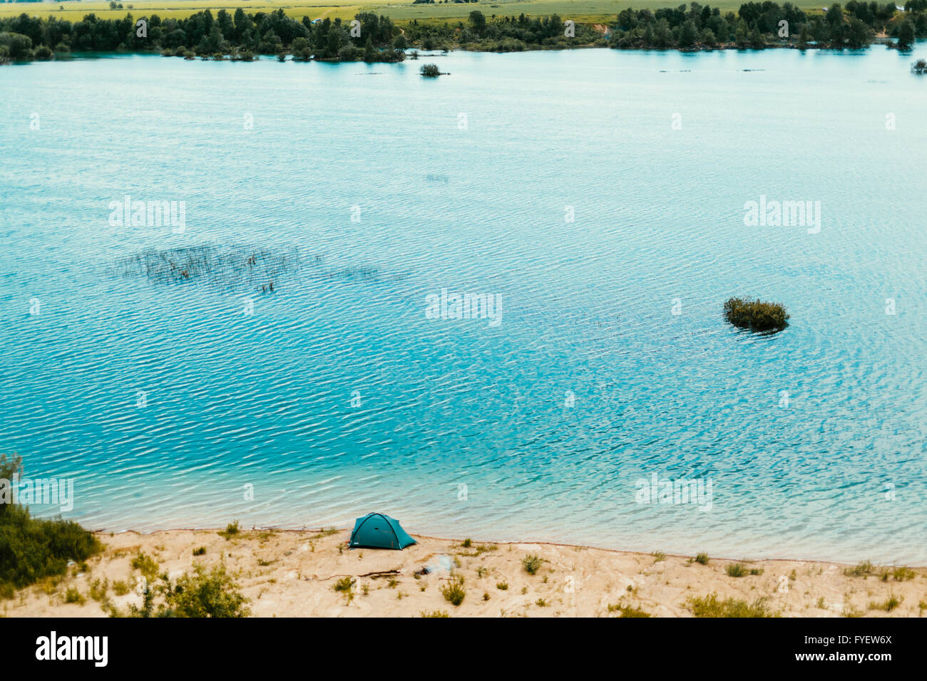 Beautiful landscape of blue lake and trees. Stock Photo