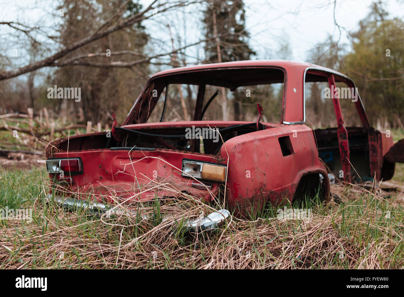 Red russian old broken car. Stock Photo