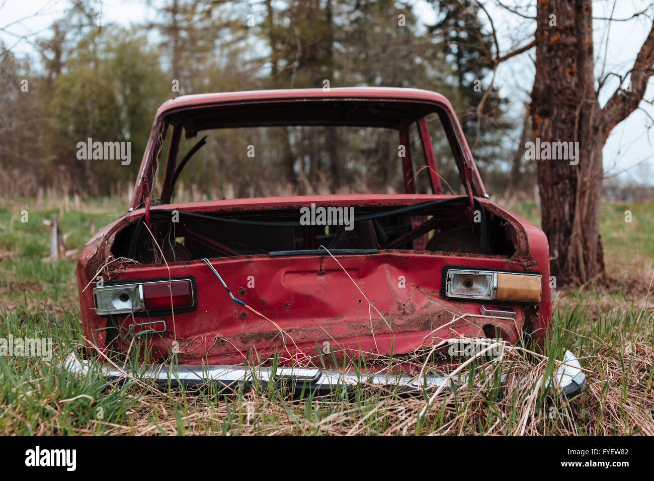 Red russian old broken car. Stock Photo