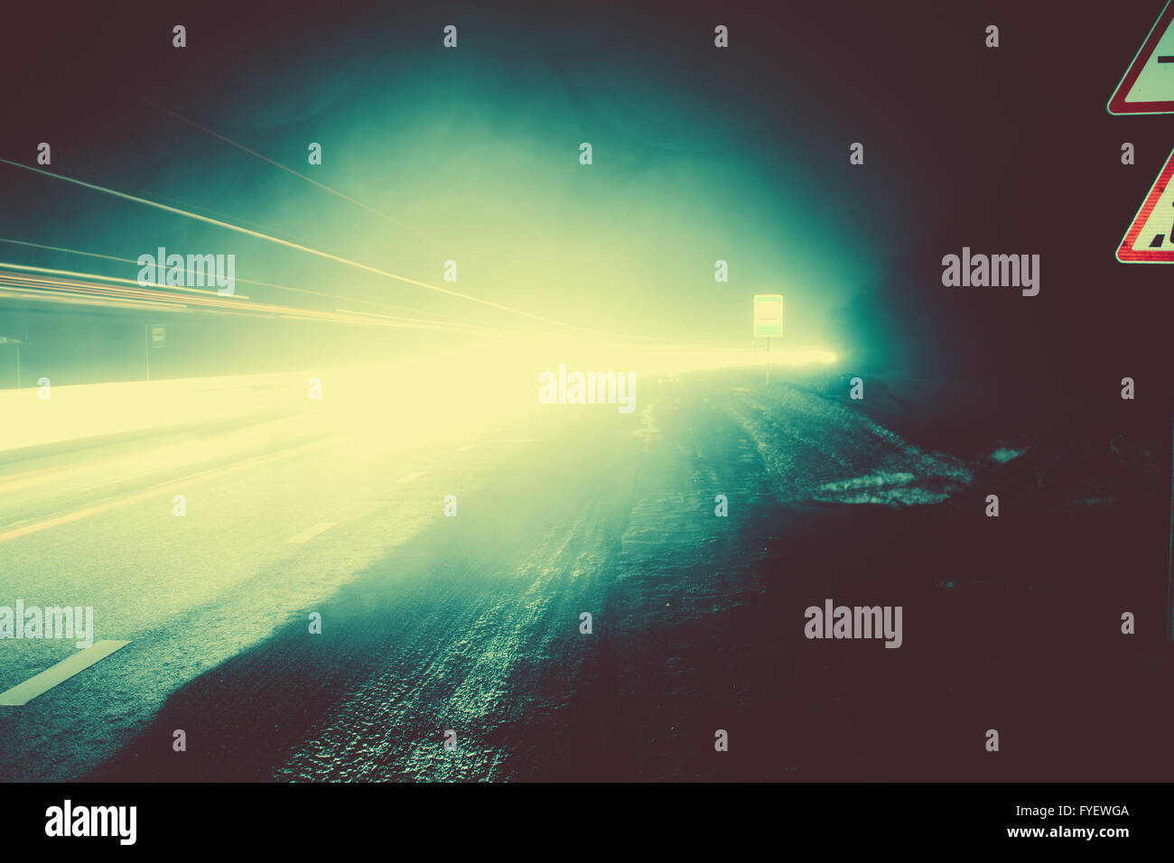 Car light trails in the road at night Stock Photo - Alamy