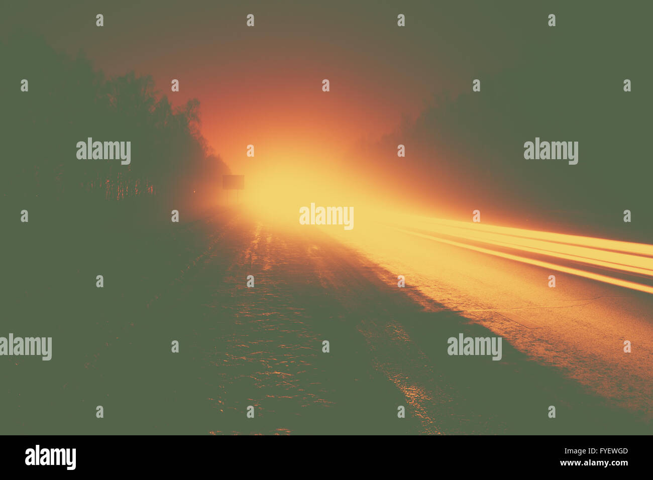 Car light trails in the road at night Stock Photo - Alamy