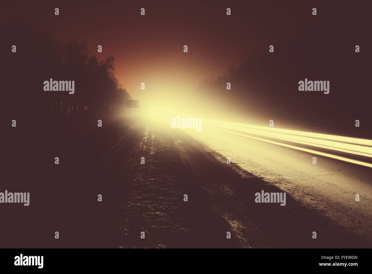 Car light trails in the road at night Stock Photo - Alamy