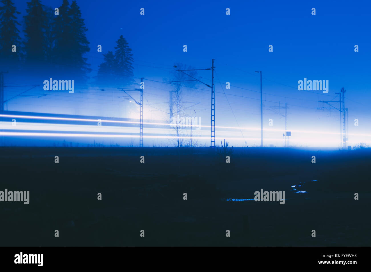 Car light trails in the road at night Stock Photo - Alamy