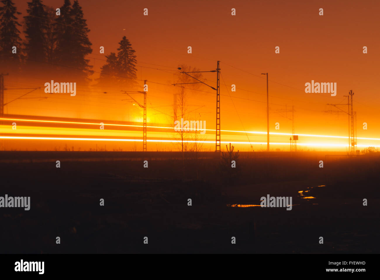 Car light trails in the road at night Stock Photo - Alamy