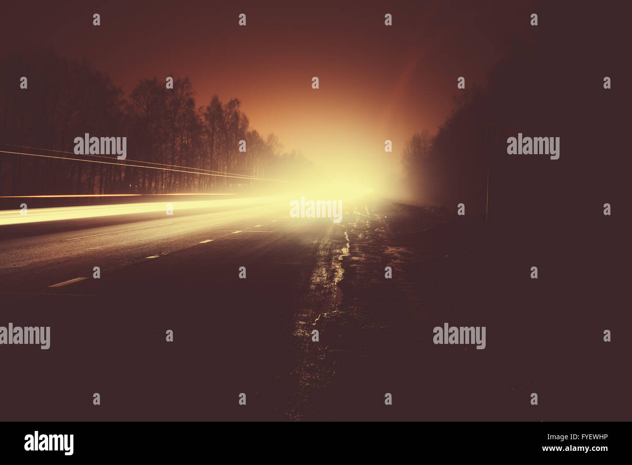 Car light trails in the road at night Stock Photo - Alamy