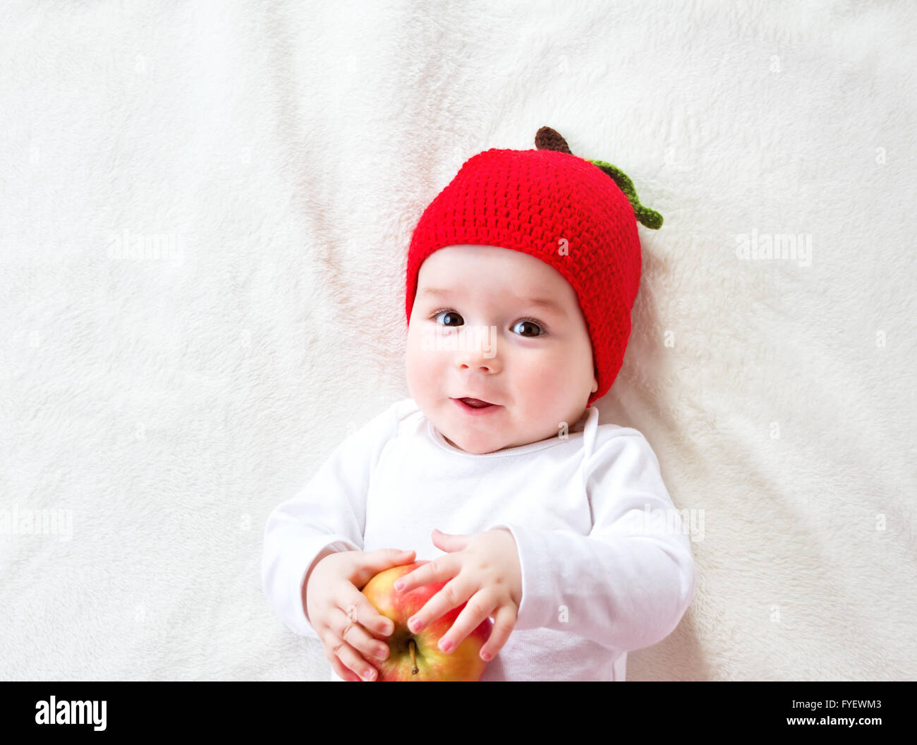 seven month old baby with apples Stock Photo Alamy
