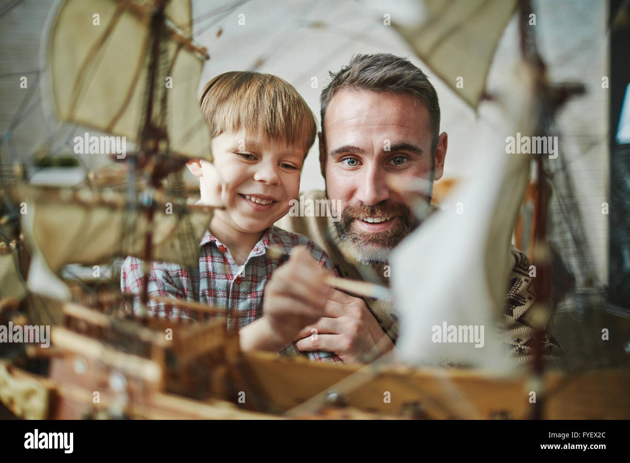 Father son toy ship hi-res stock photography and images - Alamy