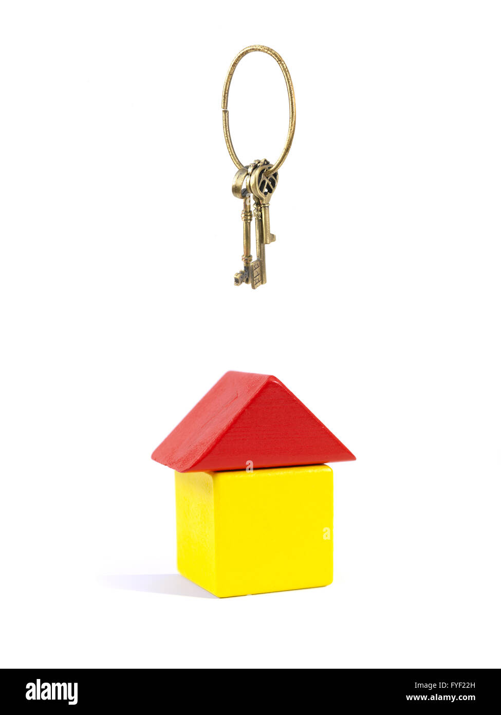 A toy house made from building blocks with vintage keys Stock Photo