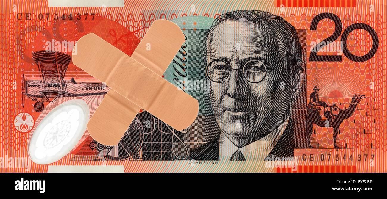 An Australian twenty dollar note and a bandaid Stock Photo