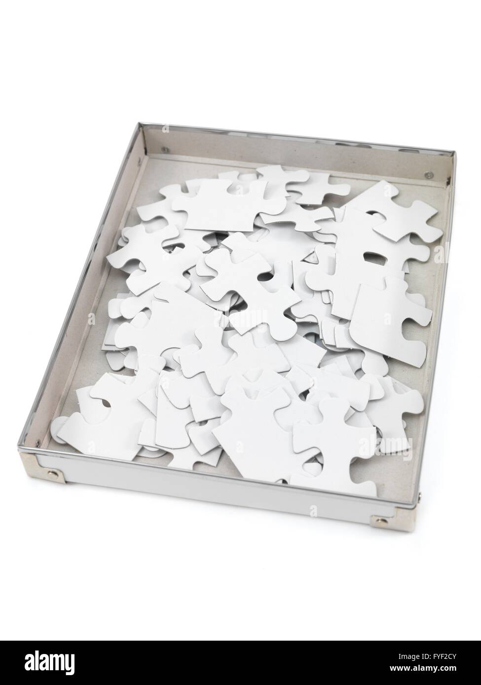 Jigsaw puzzle pieces isolated against a white background Stock Photo