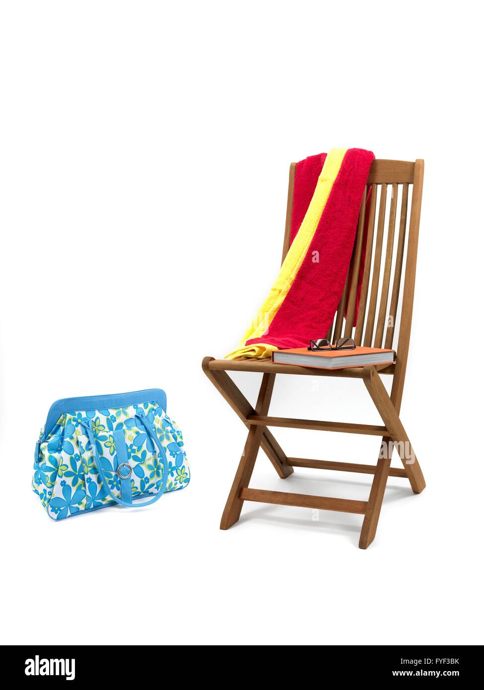 A deck chair isolated against a white background Stock Photo - Alamy