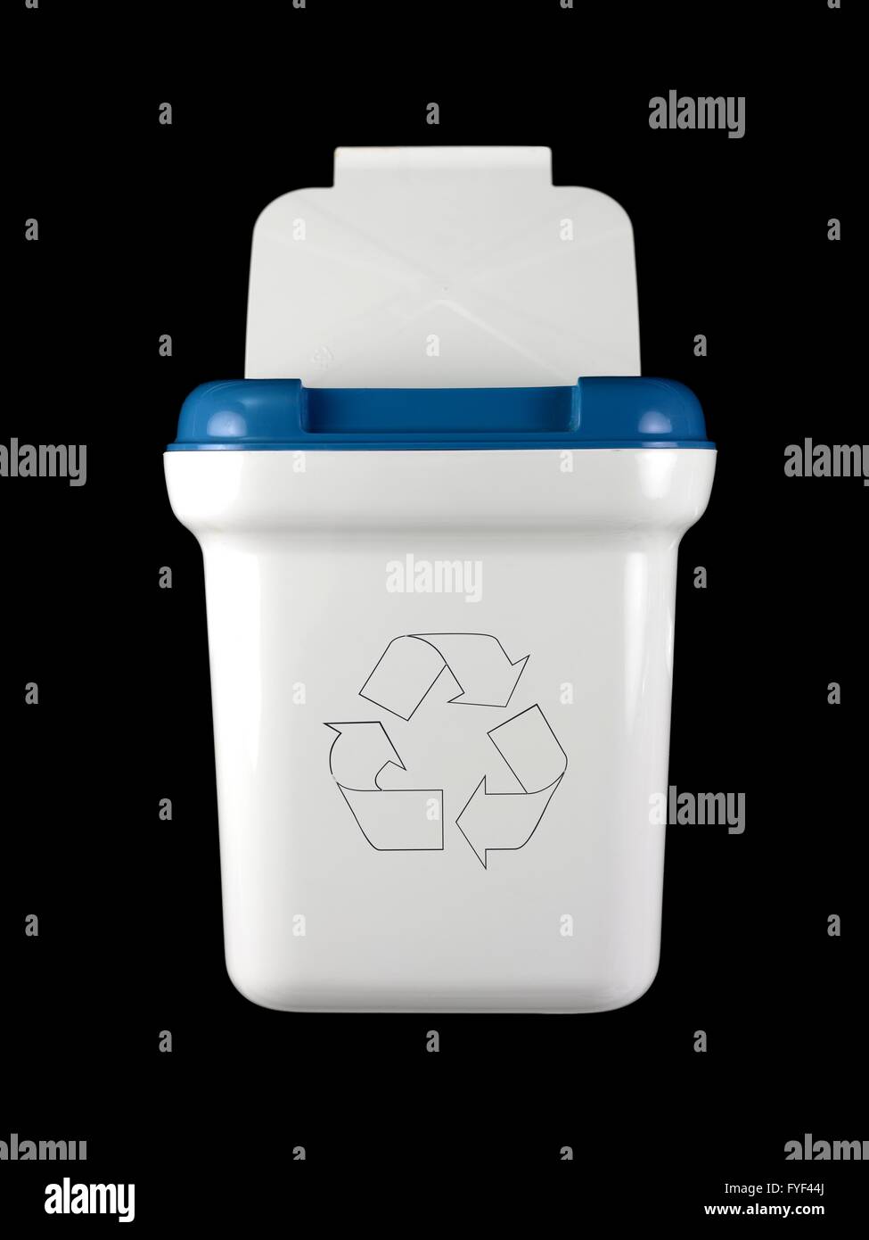 A rubbish bin isolated against a black background Stock Photo - Alamy