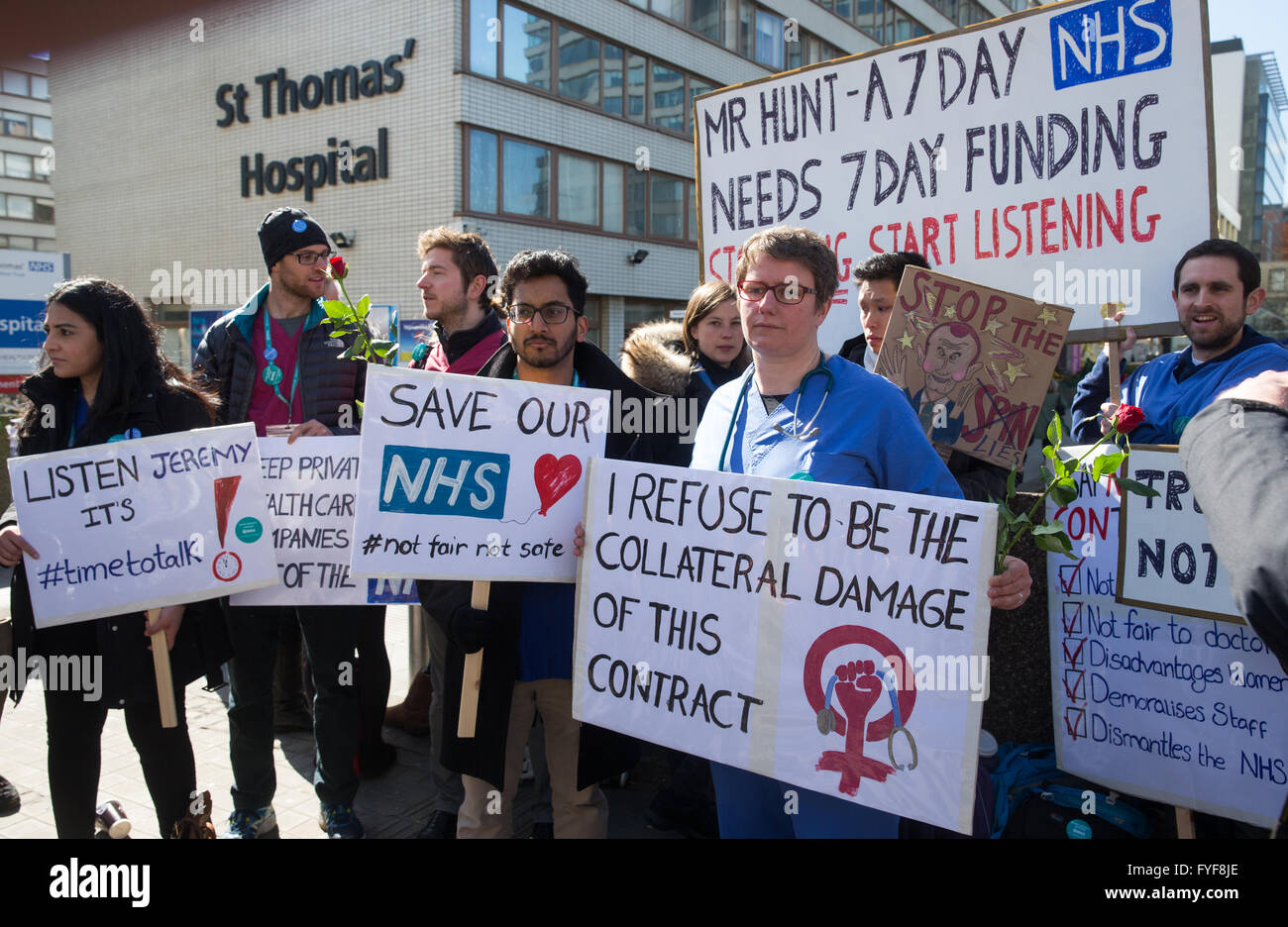 Junior doctors on the picket line outside St Thomas' hospital on Westminster Bridge. Stock Photo