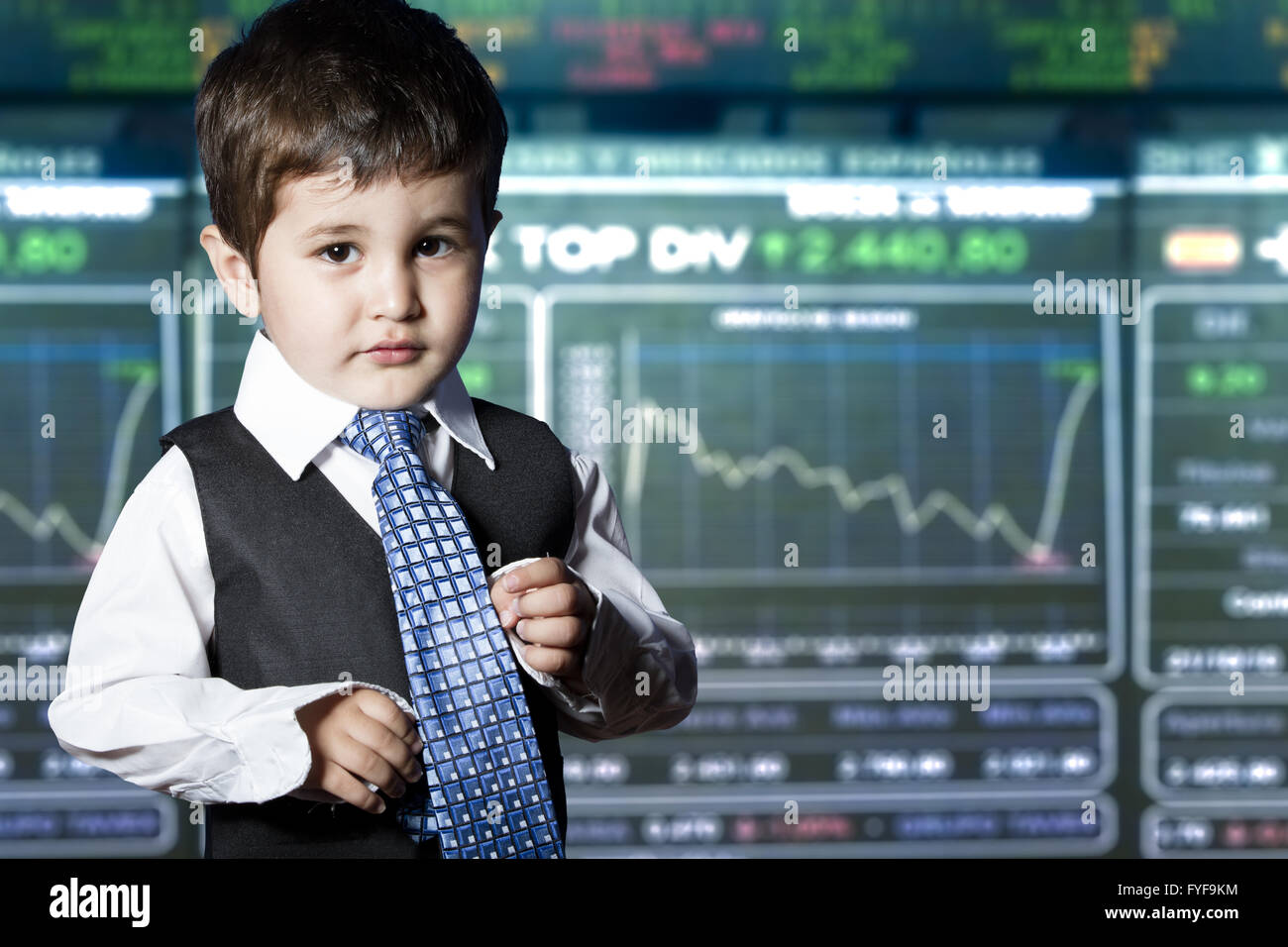Child dressed businessman with funny face. stock market Stock Photo - Alamy