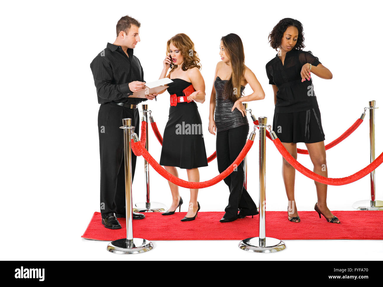 Series with a multi-ethnic group of friends and a red carpet and stanchions.  Could be used for ads for a fancy night out or a p Stock Photo