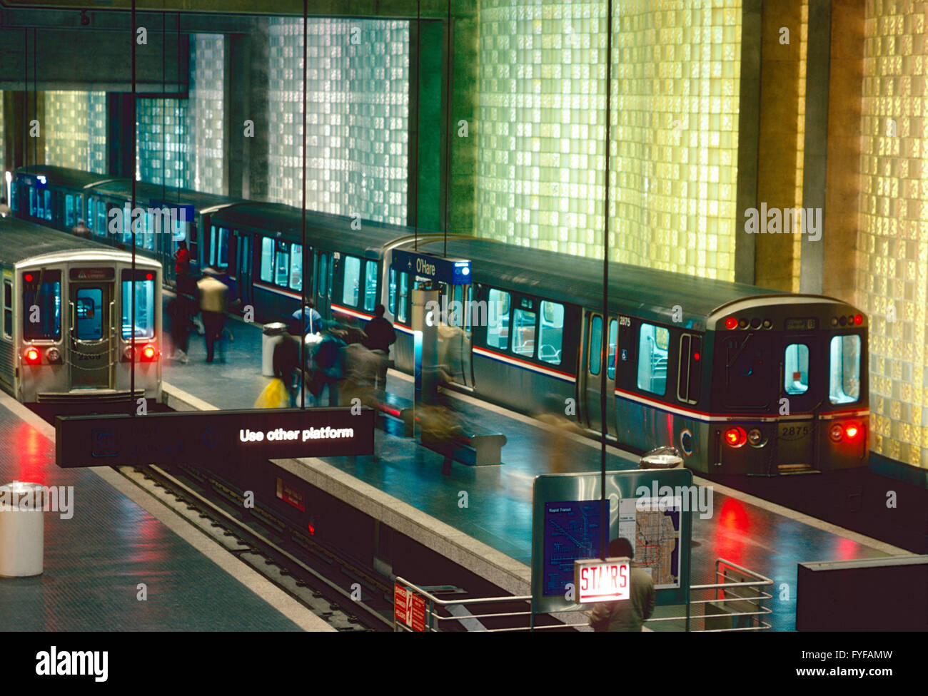 Subway station, train car & block glass walls at Chicago's O'Hare International Airport Stock Photo