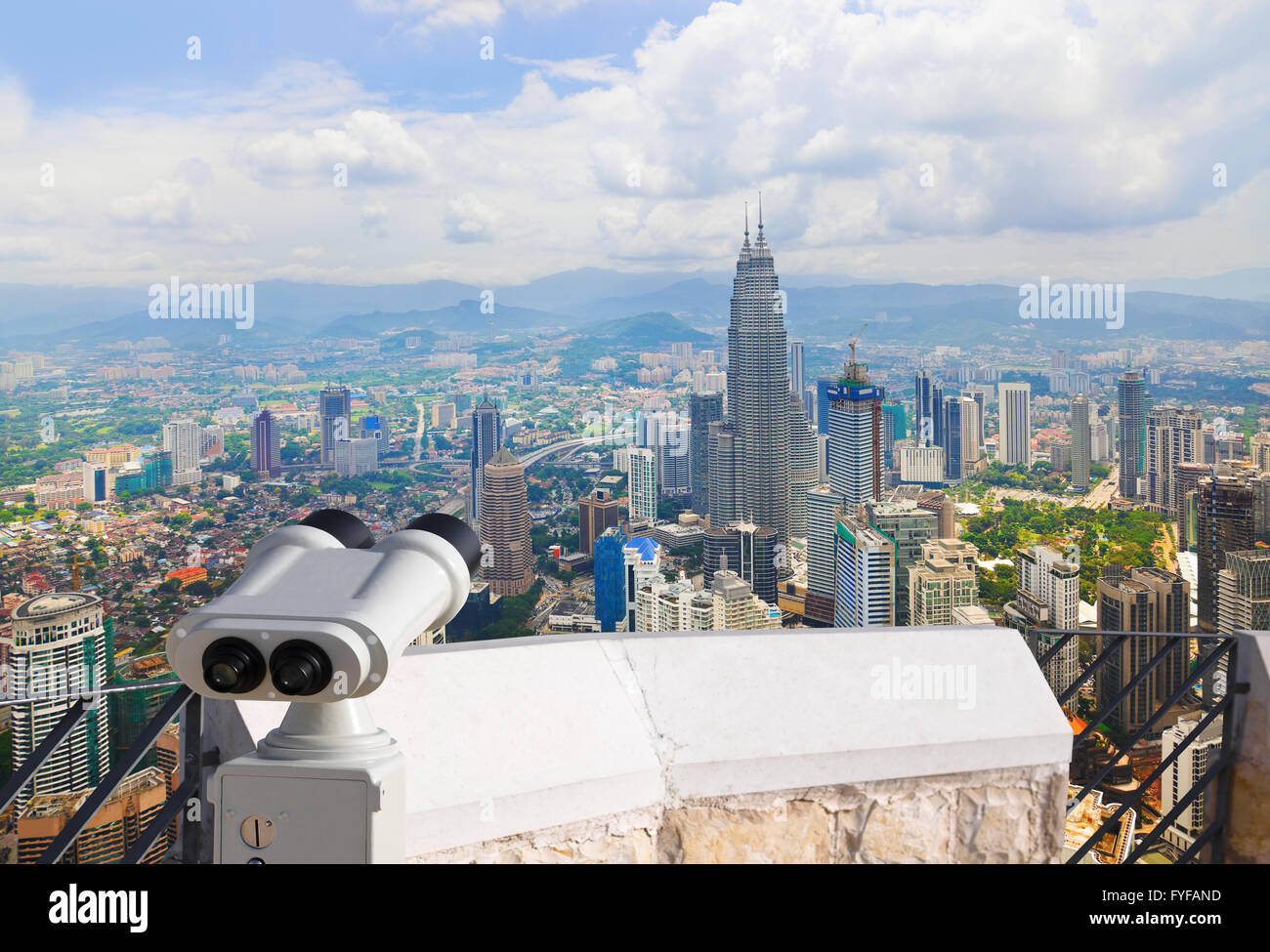 Binoculars and Kuala Lumpur (Malaysia) city view Stock Photo Alamy