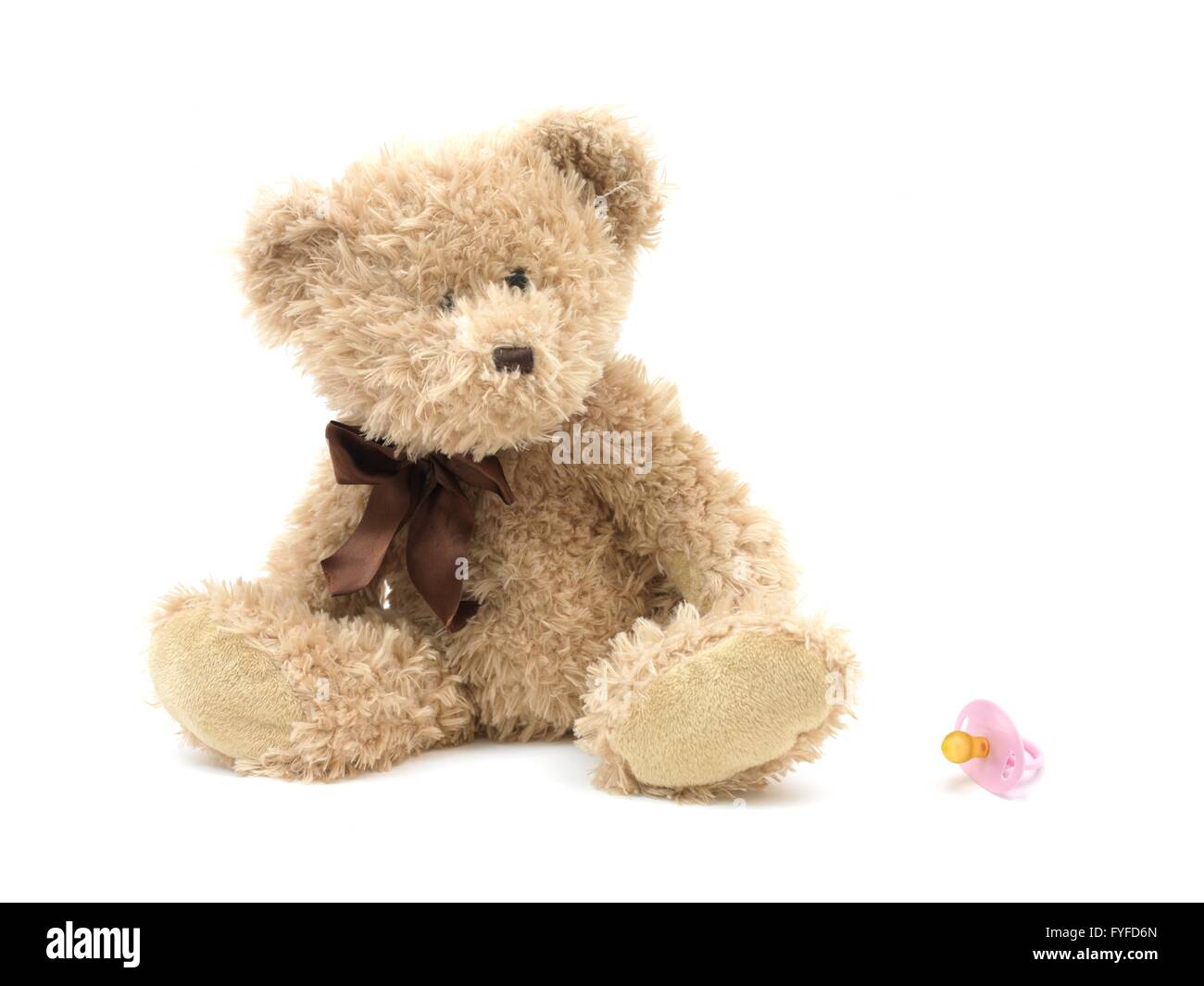 A teddy bear isolated against a white background Stock Photo - Alamy