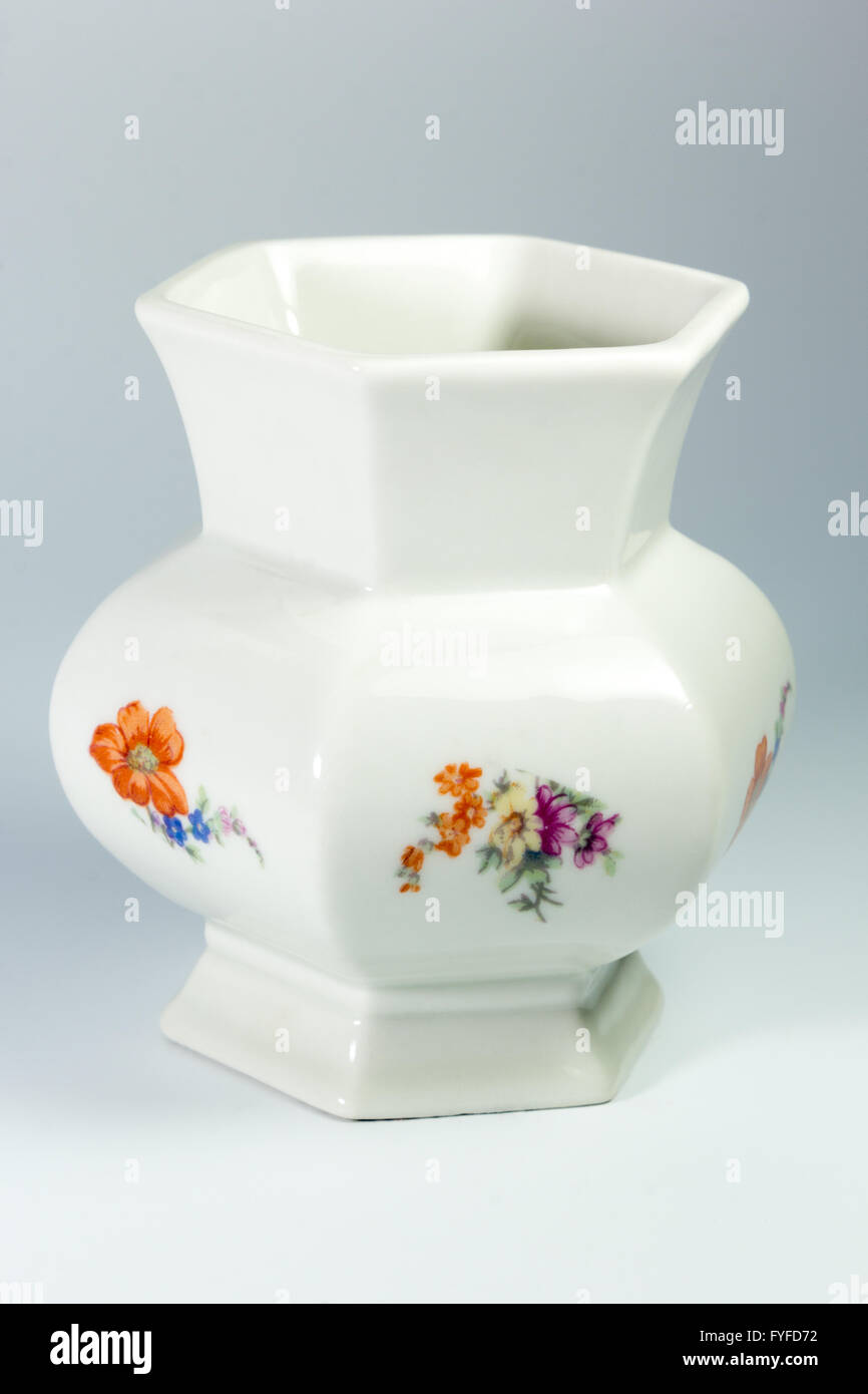 white porcelain vase with flowers on a white background Stock Photo Alamy