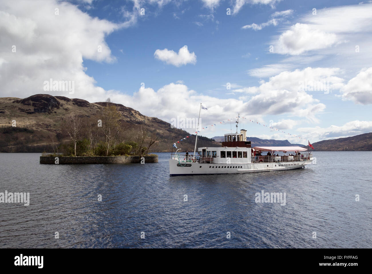 The Steamship Sir Walter Scott arriving at Stronachlachar Loch Katrine Scottish Highlands Scotland United Kingdom Stock Photo