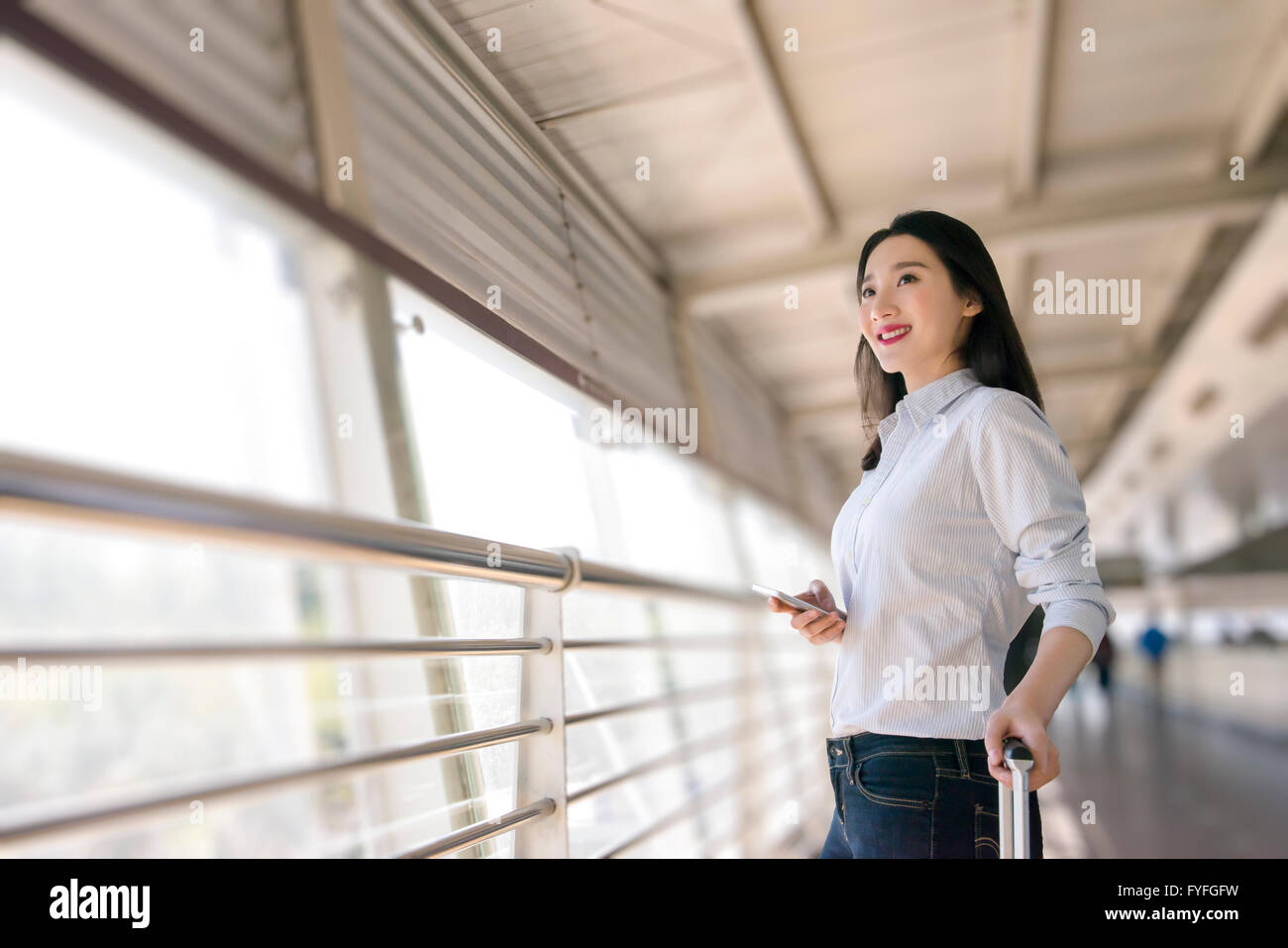 Women boarding plane hi-res stock photography and images - Alamy