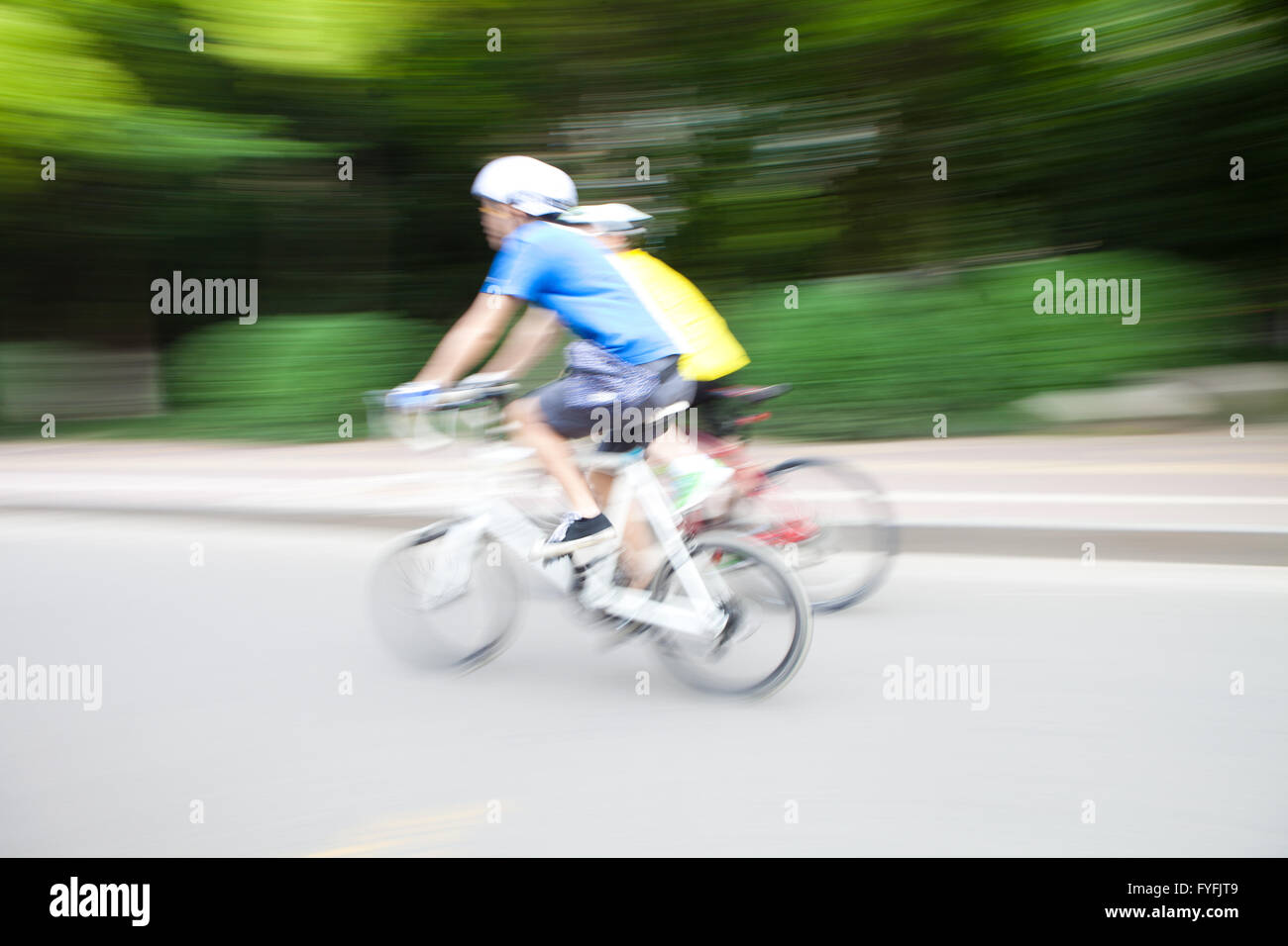 Woman enjoying fast bike ride hi-res stock photography and images - Alamy