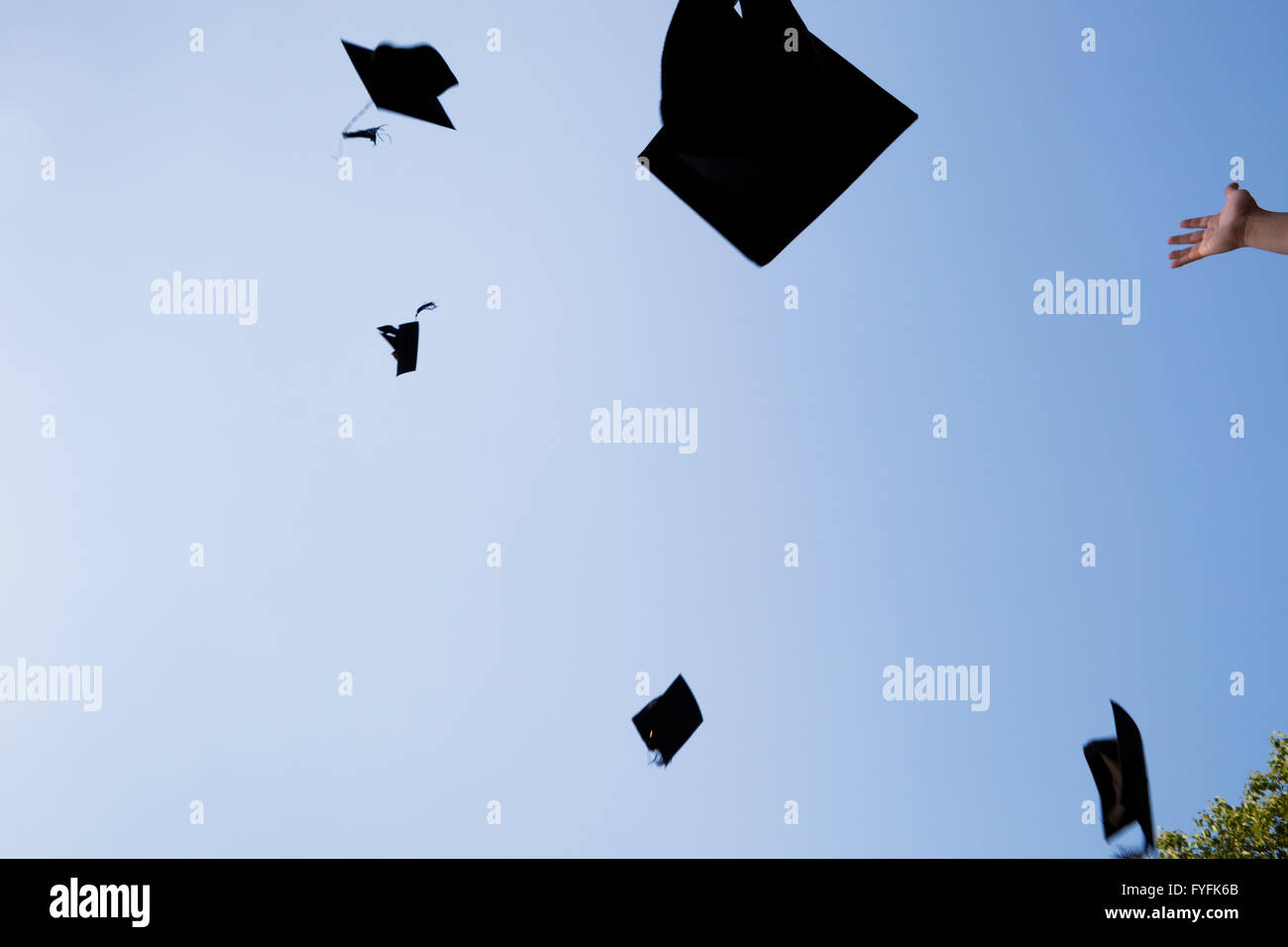 high school graduation hats high Stock Photo Alamy