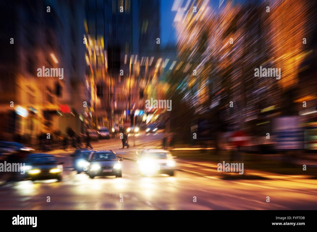 Big city life at night. Dynamic motion blur Stock Photo