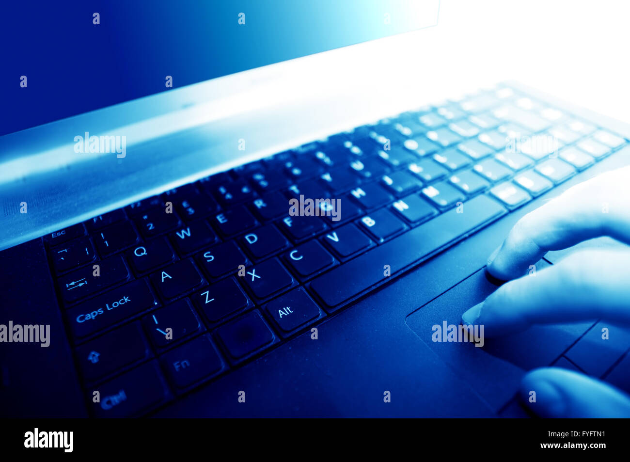 Modern business equipment. Typing on keyboard Stock Photo