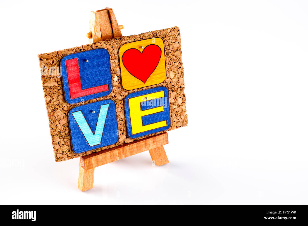 Wooden easel and cork board with word Love. White background. Letter draw  by me Stock Photo - Alamy