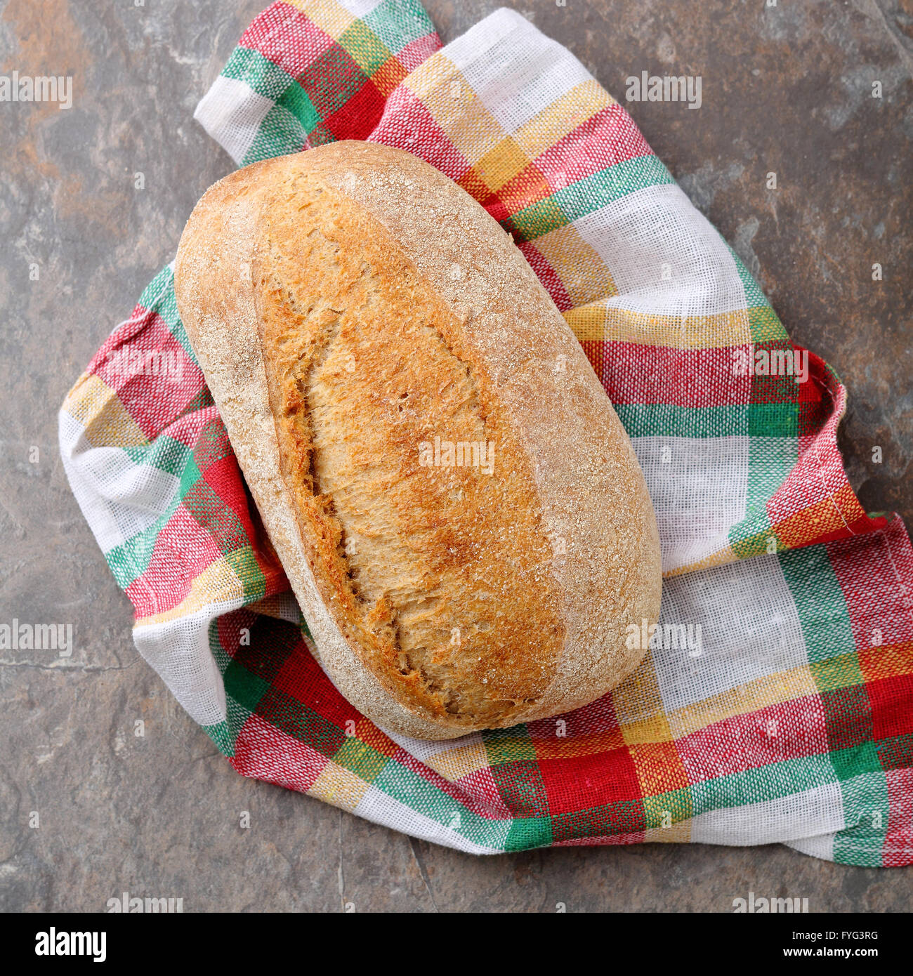 whole italian bread on napkin close-up Stock Photo