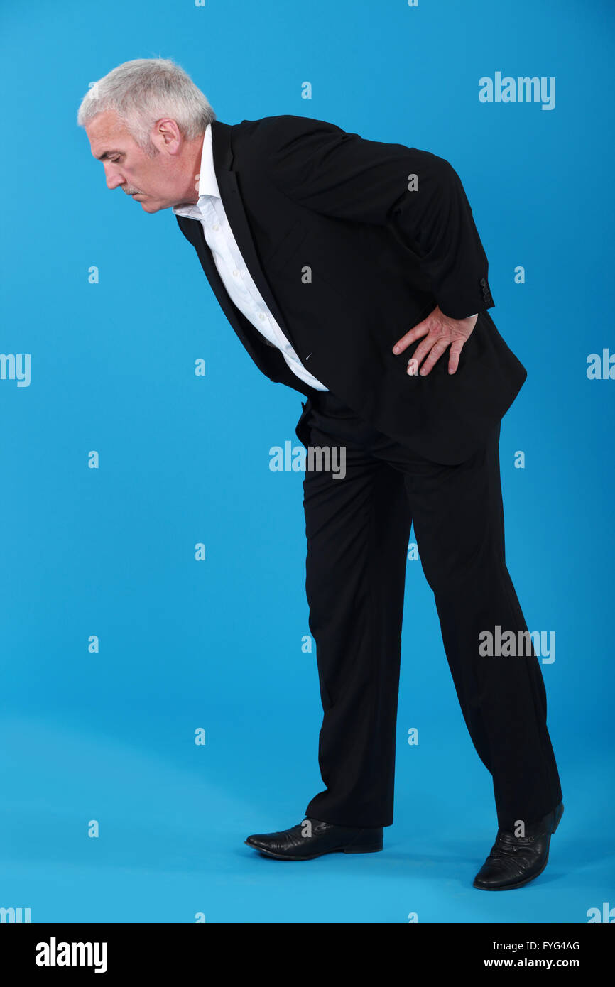 Man bending over hi-res stock photography and images - Alamy