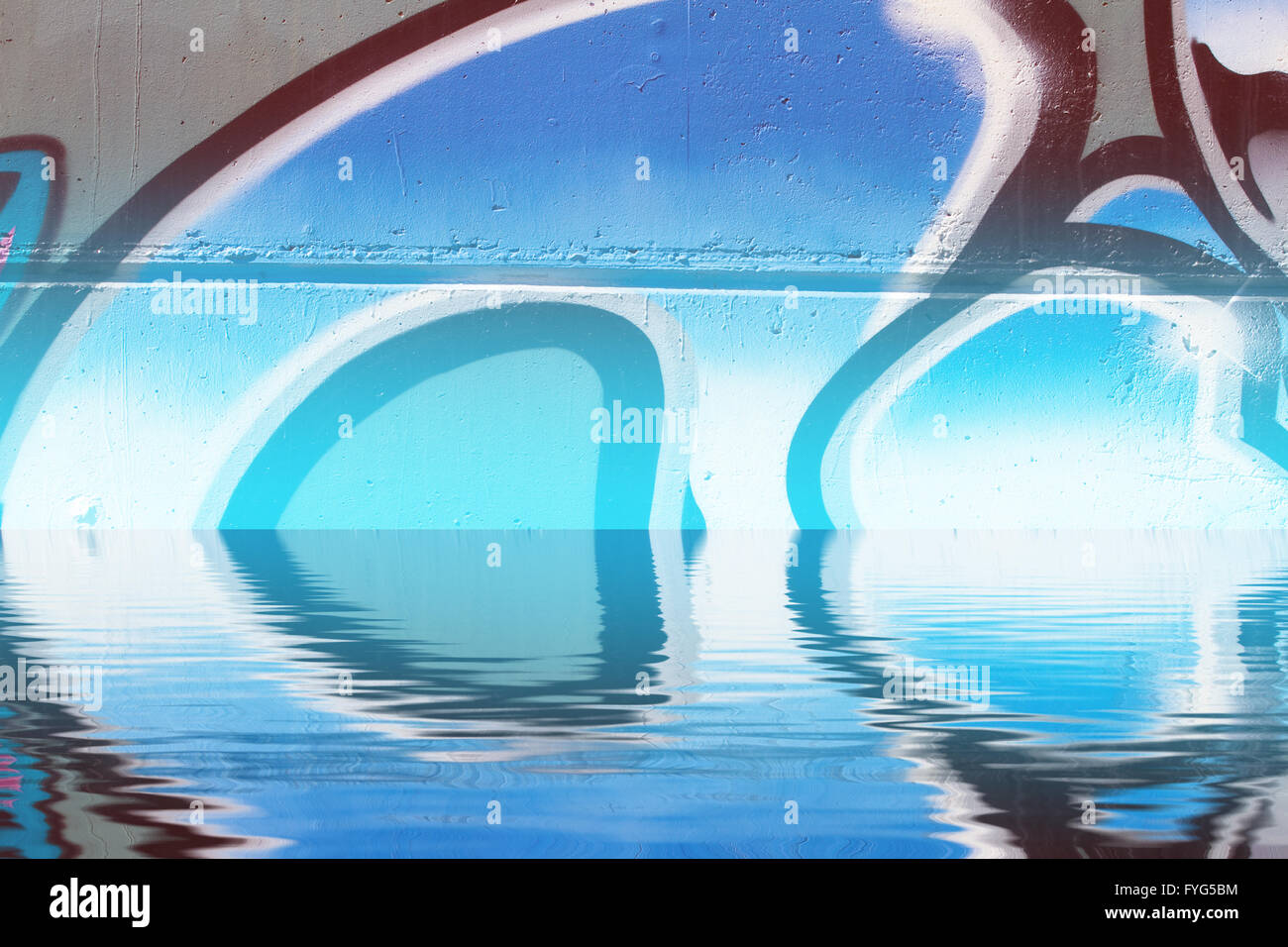 Graffiti reflection in the water, artistic chrome letters Stock Photo