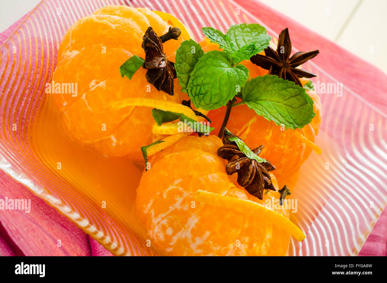 Mandarins in spiced syrup Stock Photo Alamy