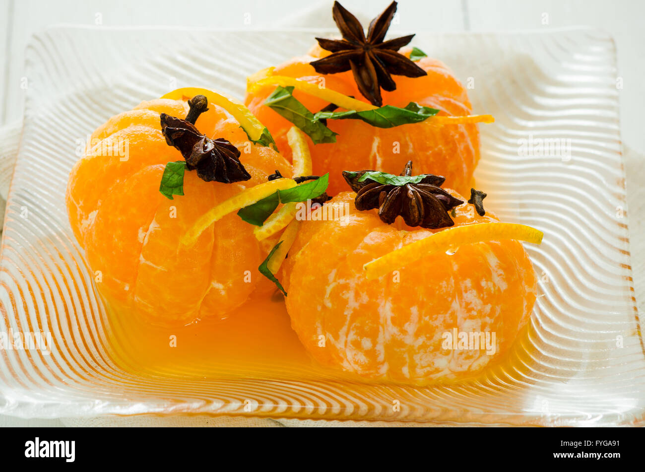 Mandarins in spiced syrup Stock Photo Alamy