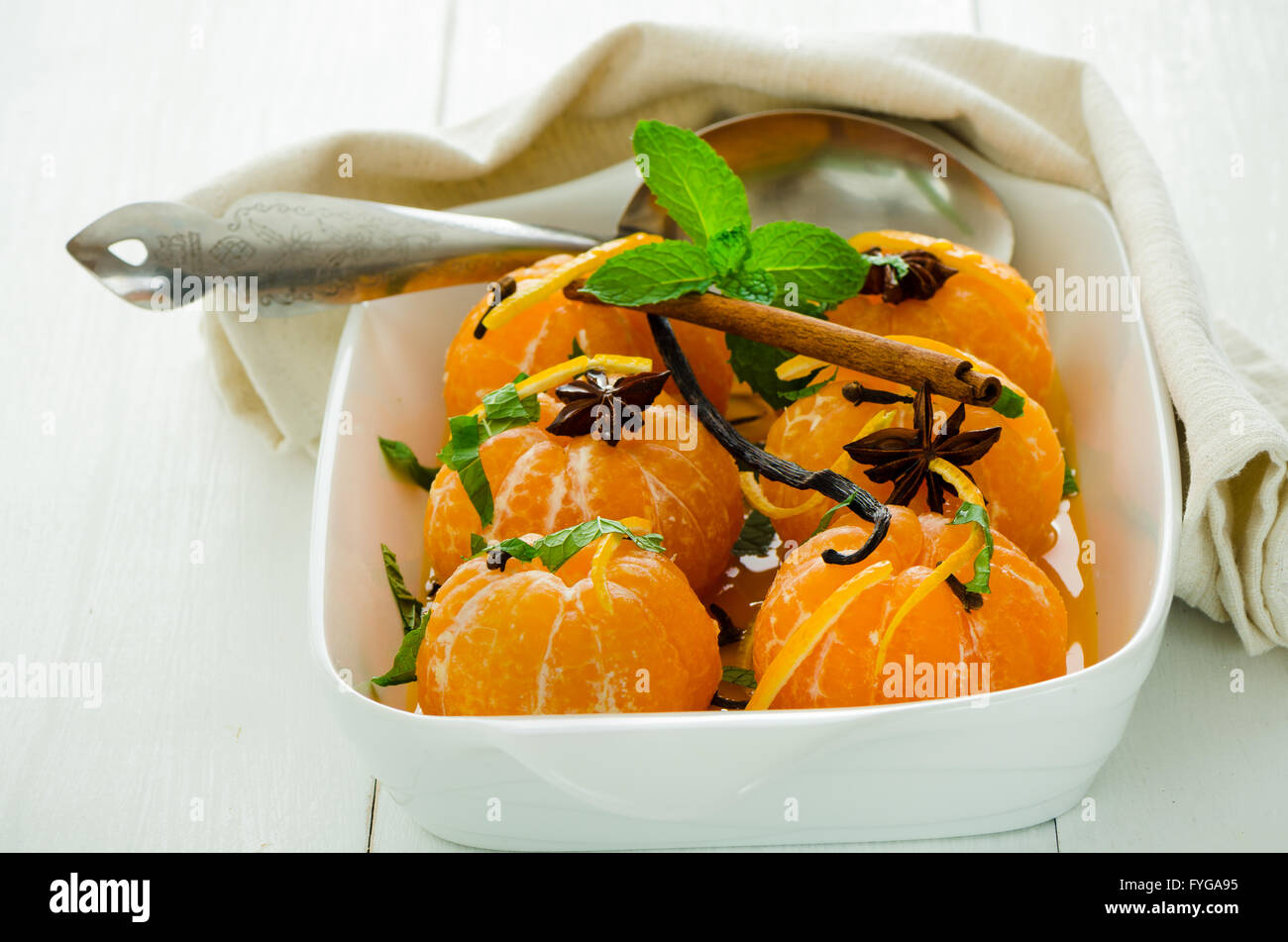 Mandarins in spiced syrup Stock Photo Alamy