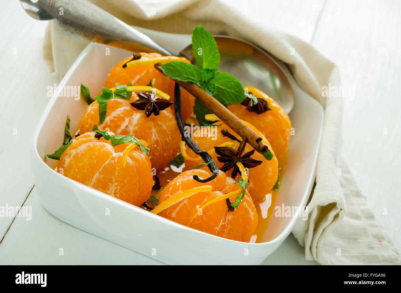 Mandarins in spiced syrup Stock Photo Alamy