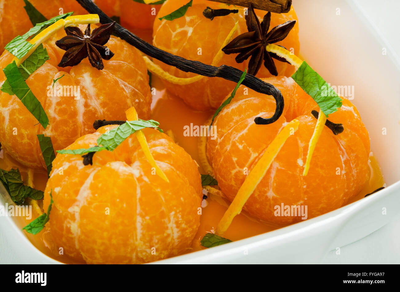 Mandarins in spiced syrup Stock Photo Alamy