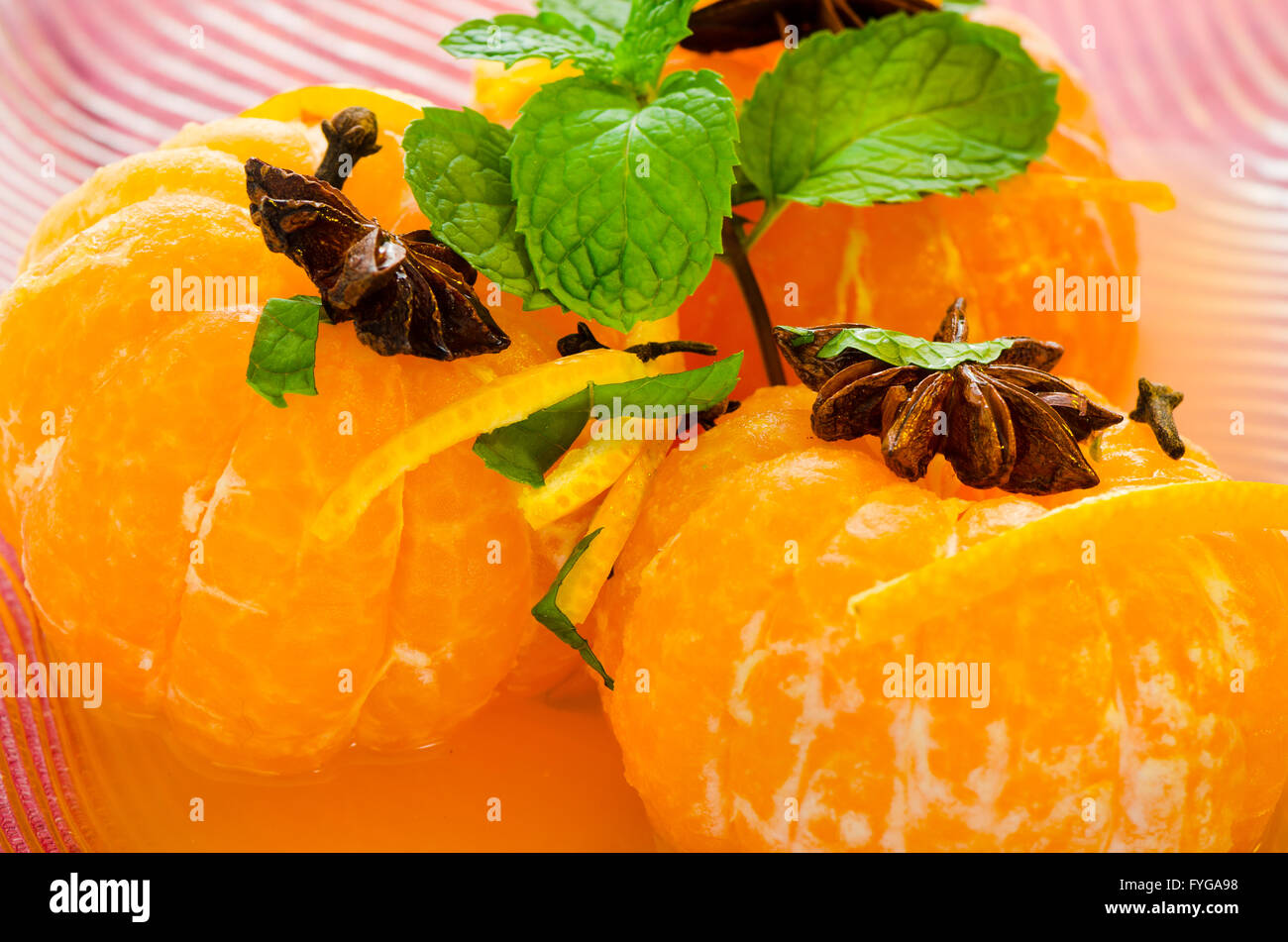 Mandarins in spiced syrup Stock Photo Alamy
