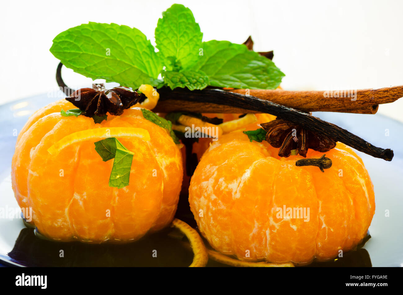Mandarins in spiced syrup Stock Photo Alamy