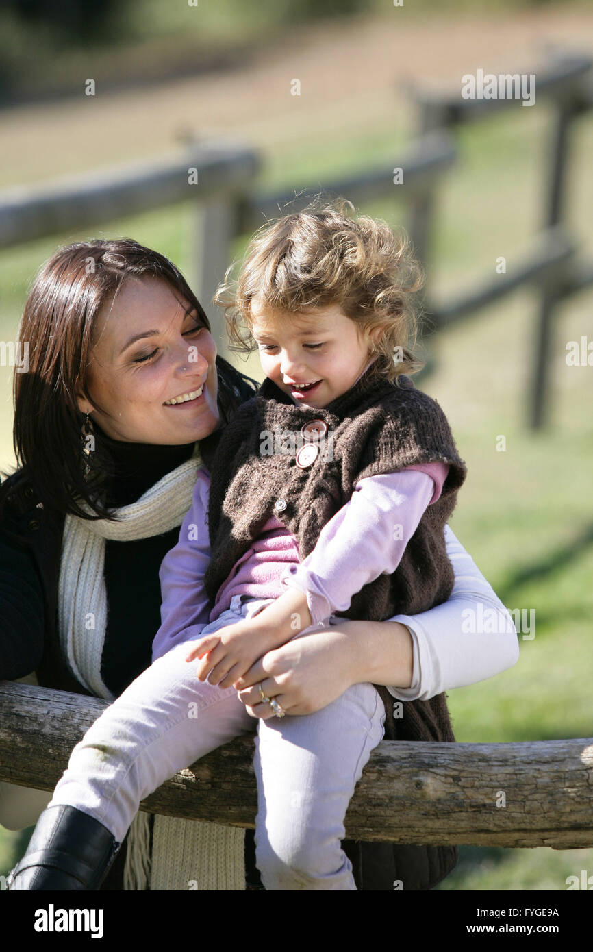 Mother spending quality time with her daughter in the countryside Stock Photo