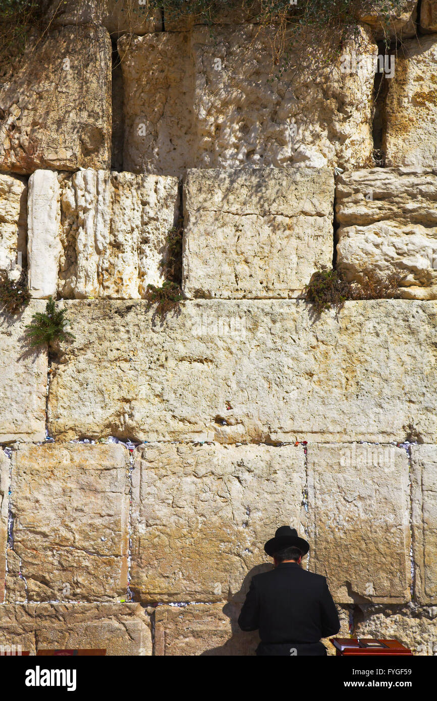 The religious Jew praying at the Western wall Stock Photo