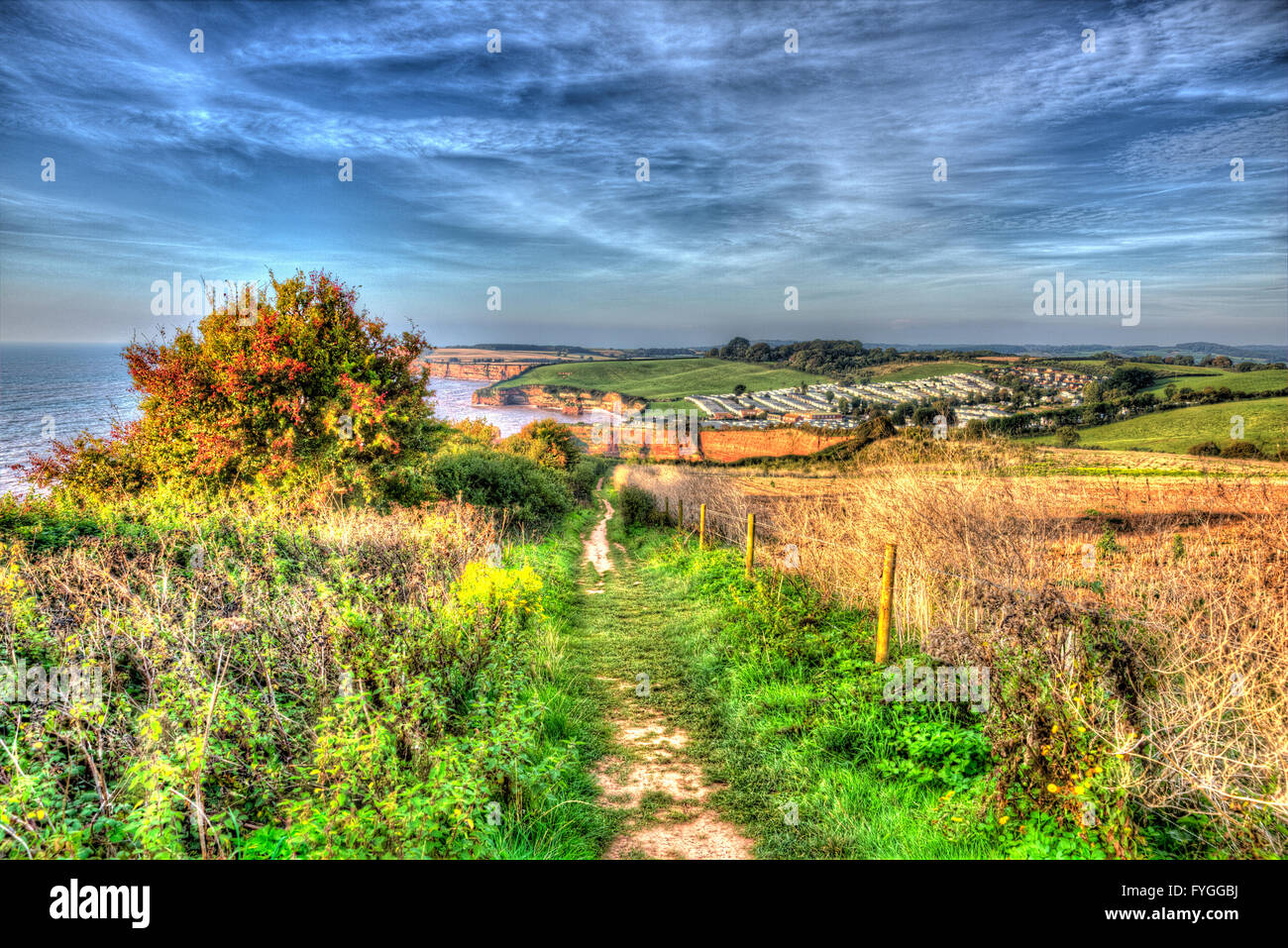 Coast path walk to Ladram Bay Devon England UK Jurassic Coastline in colourful HDR Stock Photo
