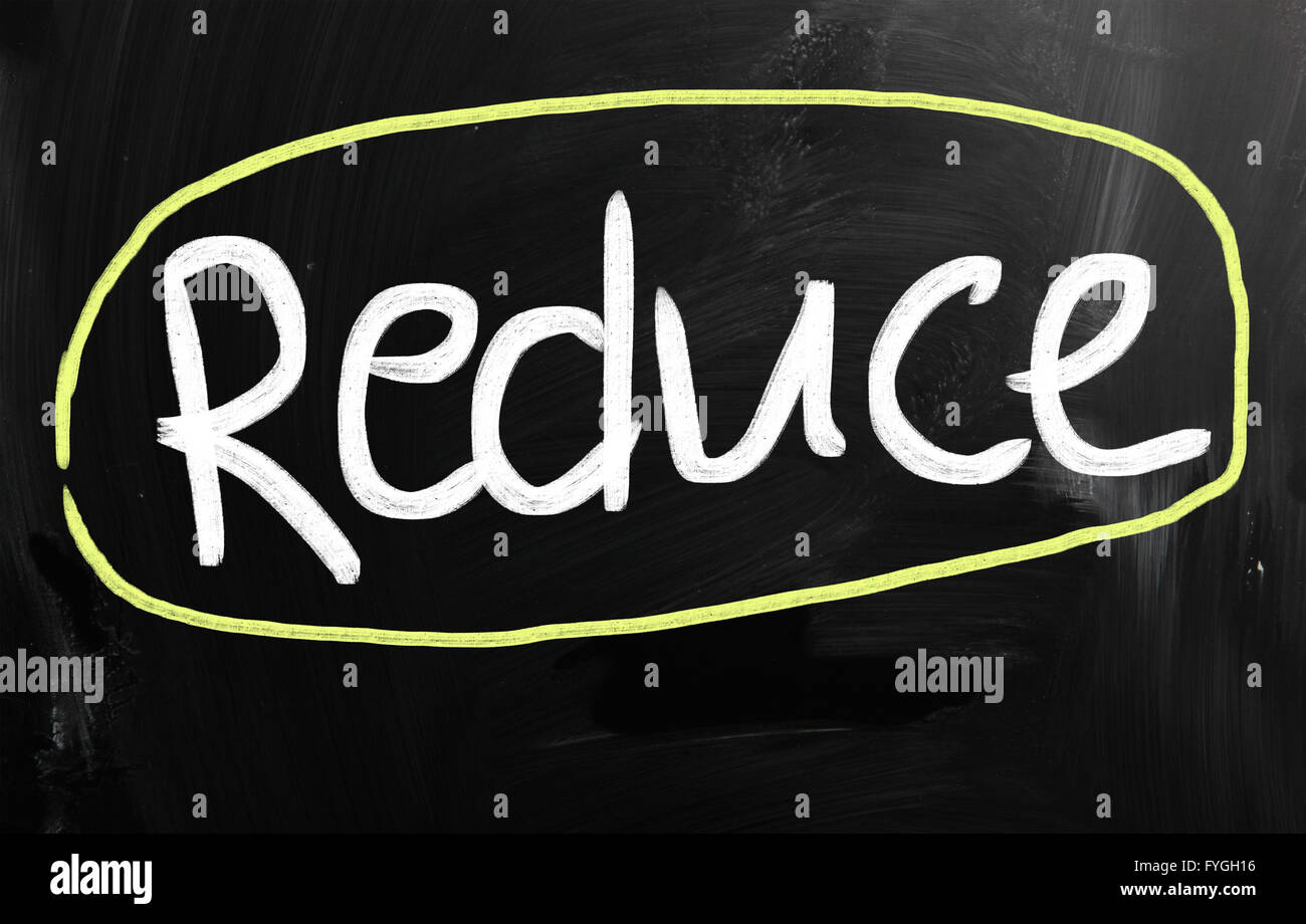 Considerably Reduce Reduce handwritten with white chalk on a blackboard Stock Photo - Alamy