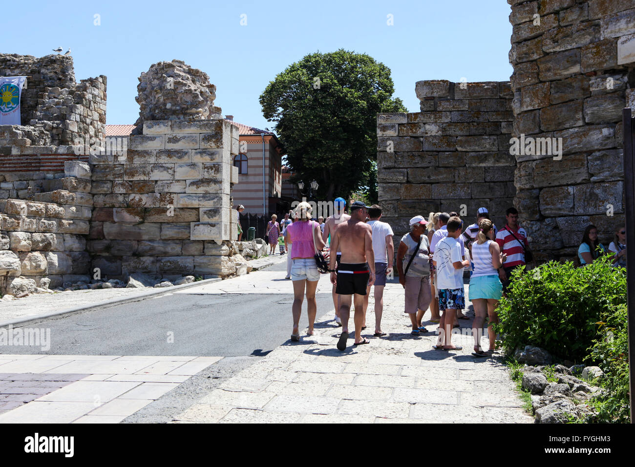 Nesebar, Bulgaria - 06/23/2013: People visit Old Town on June 23, 2013 day of Nessebar, Bulgaria. Nessebar in 1956 was declared Stock Photo