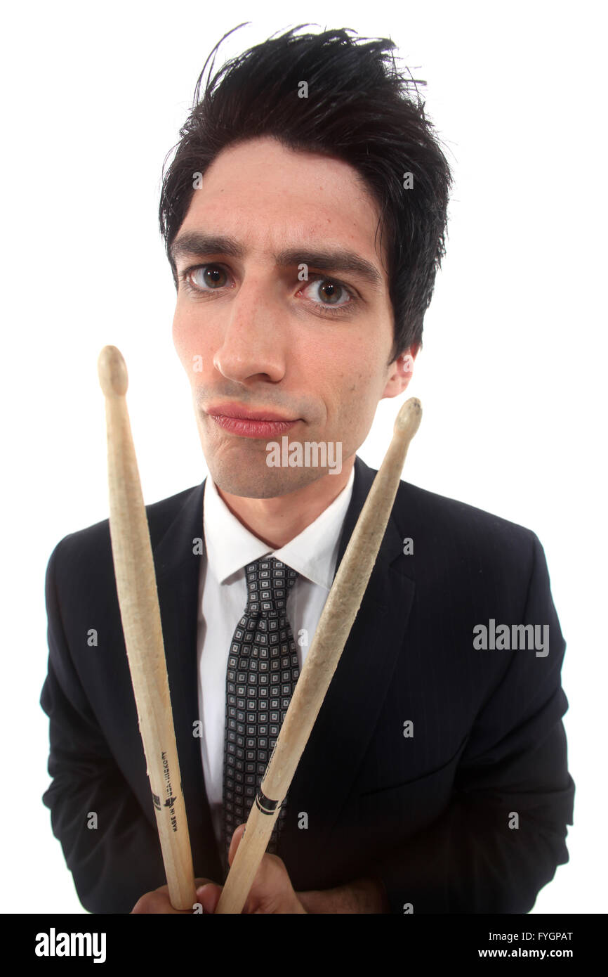 distorted image of man in suit with drumsticks Stock Photo